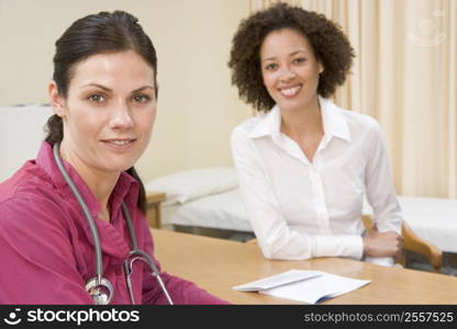 Woman in doctor&acute;s office smiling