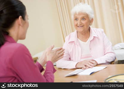 Woman in doctor&acute;s office smiling