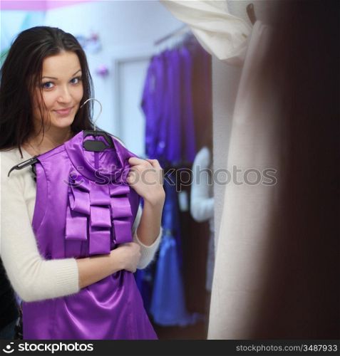woman in dress room wear dress