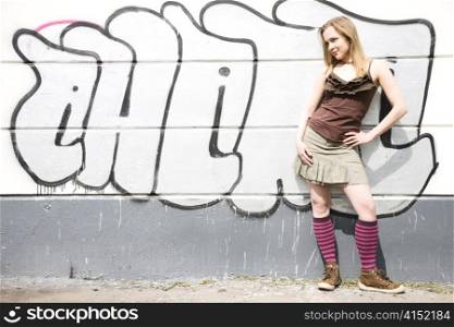 Woman In Front Of a Graffiti Wall