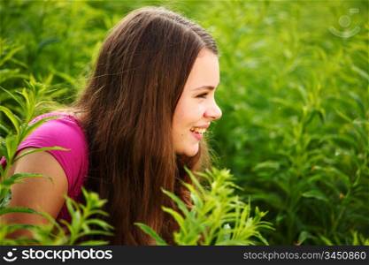 woman in grass close up