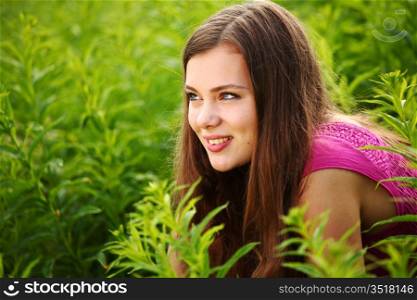 woman in grass close up