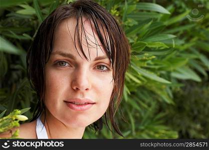 Woman in Green Foliage