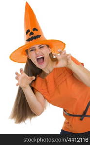 Woman in Halloween hat making scaring pose