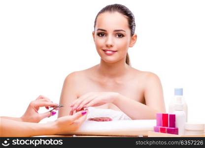 Woman in hand treatment manicure concept