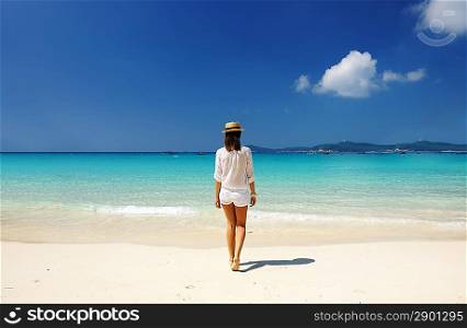 Woman in hat at beach