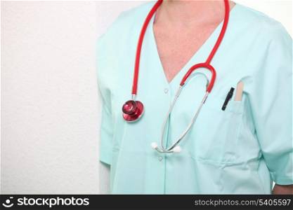 Woman in hospital scrubs