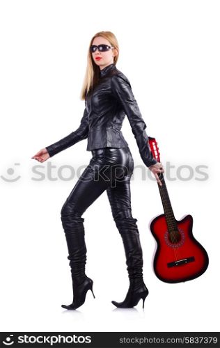 Woman in leather suit with guitar on white
