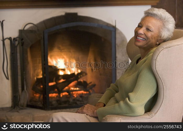 Woman in living room laughing