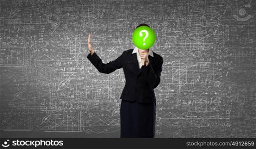 Woman in mask. Businesswoman hiding her face behind paper mask with question sign and showing stop gesture