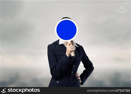 Woman in mask. Unrecognizable businesswoman hiding her face behind mask