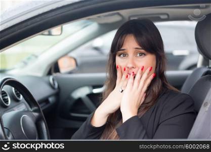 Woman in panic after having a car crash