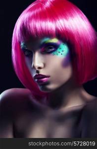 woman in pink wig in dark