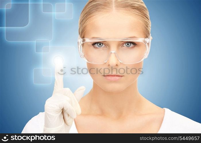 woman in protective glasses and gloves working with virtual screen