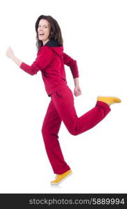 Woman in red costume doing exercises on white