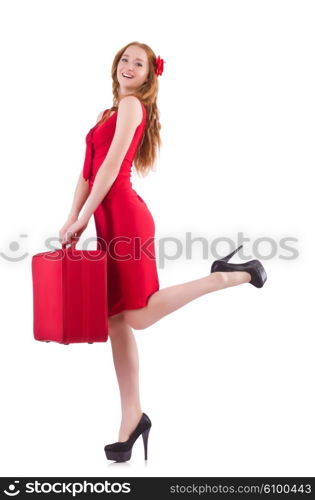 Woman in red dress and travel case isolated on white