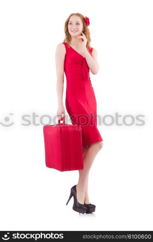 Woman in red dress and travel case isolated on white