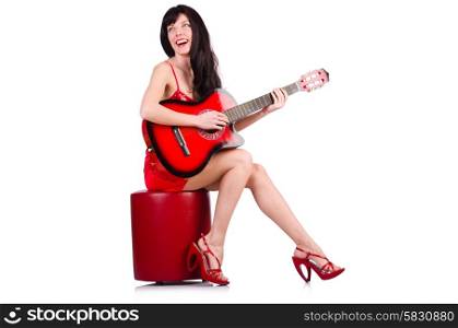 Woman in red dress playing guitar isolated on the white