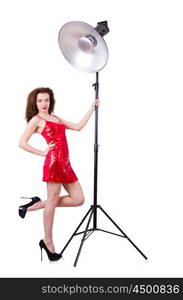 Woman in red dress posing in the studio