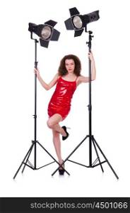 Woman in red dress posing in the studio