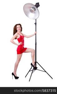 Woman in red dress posing in the studio