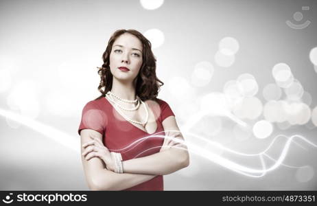 Woman in red. Portrait of young pretty woman in red dress