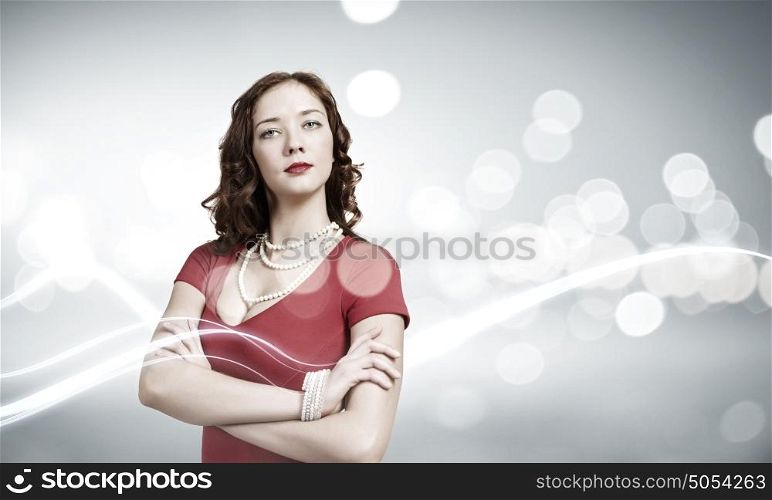 Woman in red. Portrait of young pretty woman in red dress