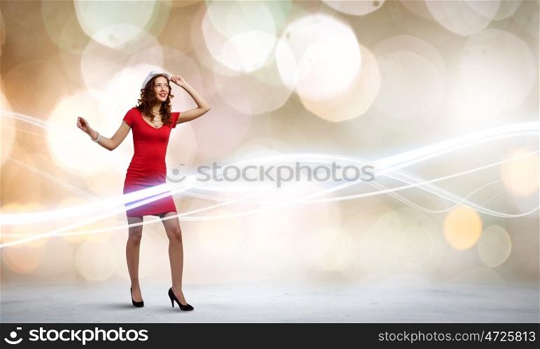 Woman in red. Pretty woman in red dress and white hat
