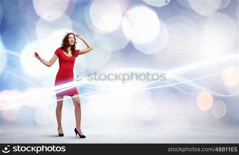 Woman in red. Woman in red dress against bokeh background