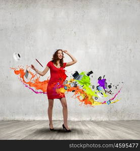 Woman in red. Woman in red dress among colorful splashes