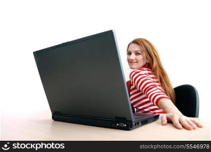woman in red working on laptop at bright office