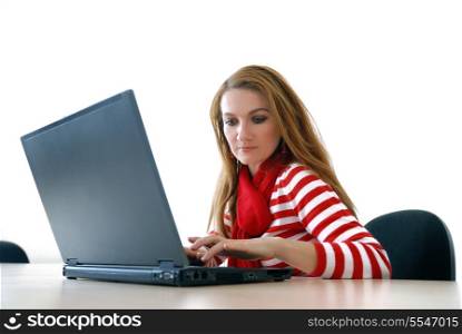 woman in red working on laptop at bright office