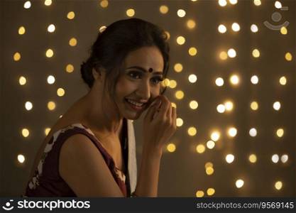  Woman in saree, smiling