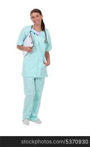 Woman in scrubs with stethoscope