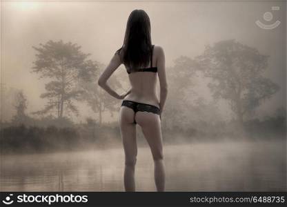 woman in sexy underwear in a mystical forest. woman in sex