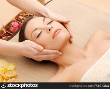 woman in spa salon lying on the massage desk. woman in spa salon