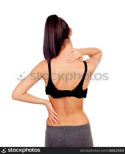 Woman in sport clothes with back pain isolated on white background