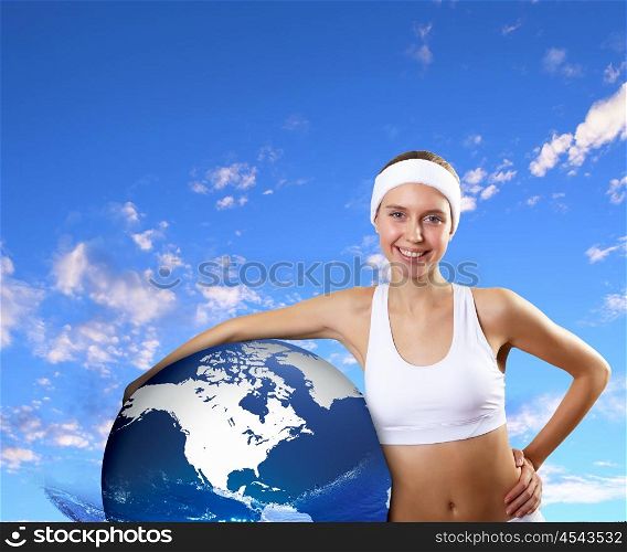 Woman in sport wear standing. Young pretty woman in sport wear standing