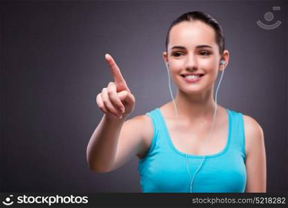 Woman in sports concept pressing buttons