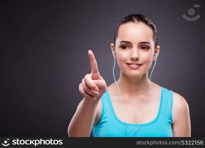 Woman in sports concept pressing buttons