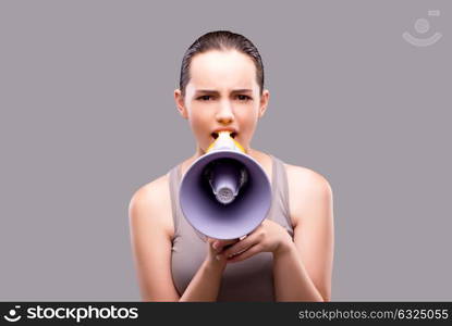 Woman in sports concept with loudspeaker