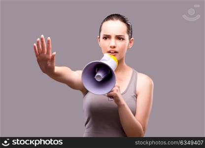 Woman in sports concept with loudspeaker