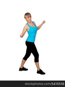 Woman in sportswear dancing isolated on white background