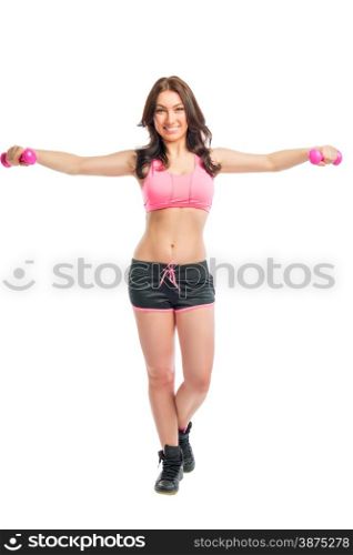 woman in sportswear with dumbbells on a white background