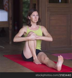 Woman in stretching yoga pose