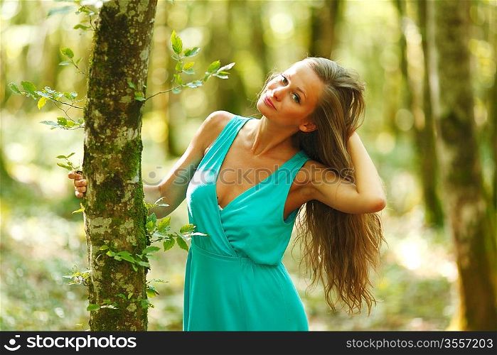 woman in summer forest