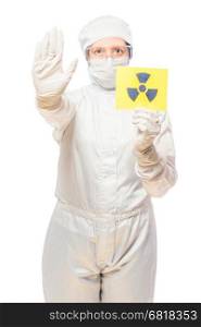 woman in the affected area with radiation in a protective suit with a sign of radiation