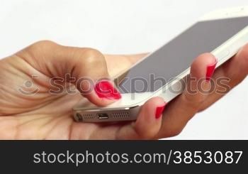 Woman in the office chatting and sending messages with her smart phone.Clerk on mobile whatsapp conversation.Female phone conversation at work.Corporate Business scene with an employee holding a phone conversation.Cellular phone chatting at wo