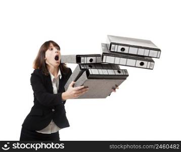 Woman in the office stumbling with a pile of folders in the hands, isolated on white