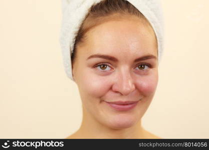 Woman in towel on head with no makeup . Woman without makeup in towel on head. Natural beauty. Purity skincare spa treatment